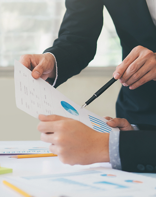 cropped-image-business-people-discussing-paperwork-office 1.png